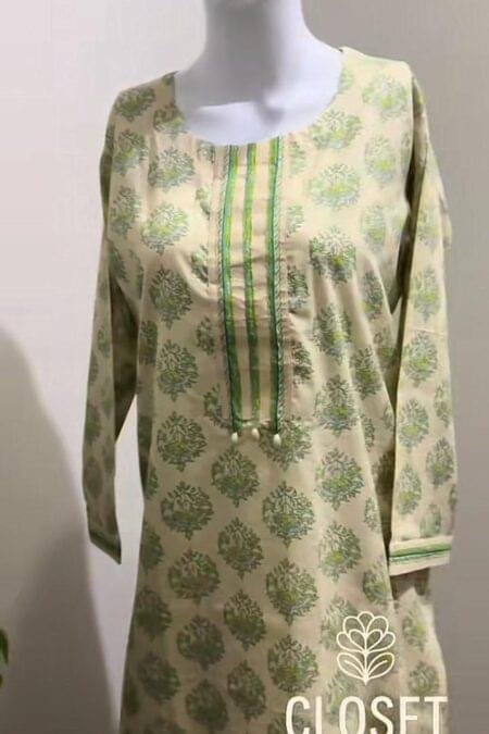 beige block print suit