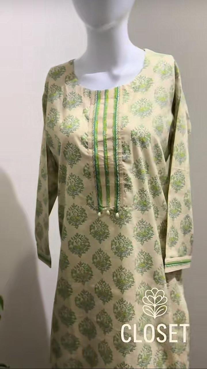 beige block print suit